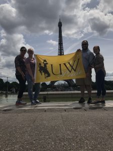 UW pride flag infront of Eiffel Tower 