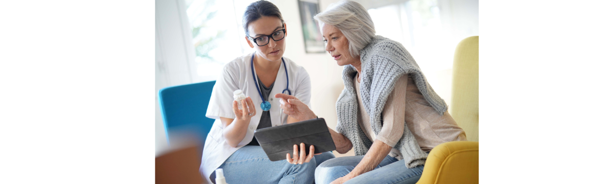 Older Adult Woman discussing medication with doctor