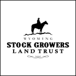 Logo of Wyoming Stock Growers Land Trust, featuring a silhouette of a cowboy on horseback above the text, with decorative flourishes.