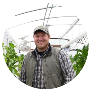 David Bunker, Operations Manager & Director of Fancy Words at Joe’s Produce, Standing in Papa Joe's Hydroponic Produce Greenhouse - Profile Image