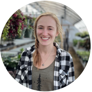 Erin Kinsey, Assistant Production Manager at Landon’s Greenhouse in Sheridan, WY, standing in Landon's Produce greenhouse - Profile Image