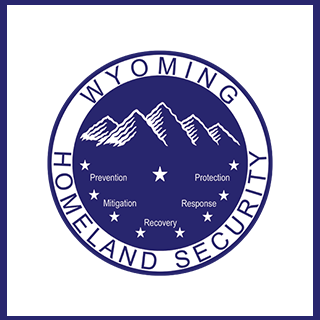 Wyoming Office of Homeland Security logo with mountains and stars inside a blue circle, featuring the words Prevention, Protection, Mitigation, Response, and Recovery.
