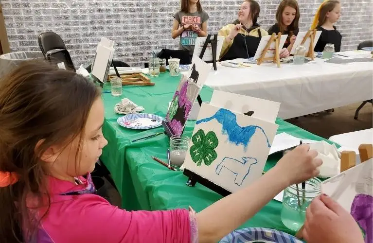 kids painting for 4-H cloverbuds project