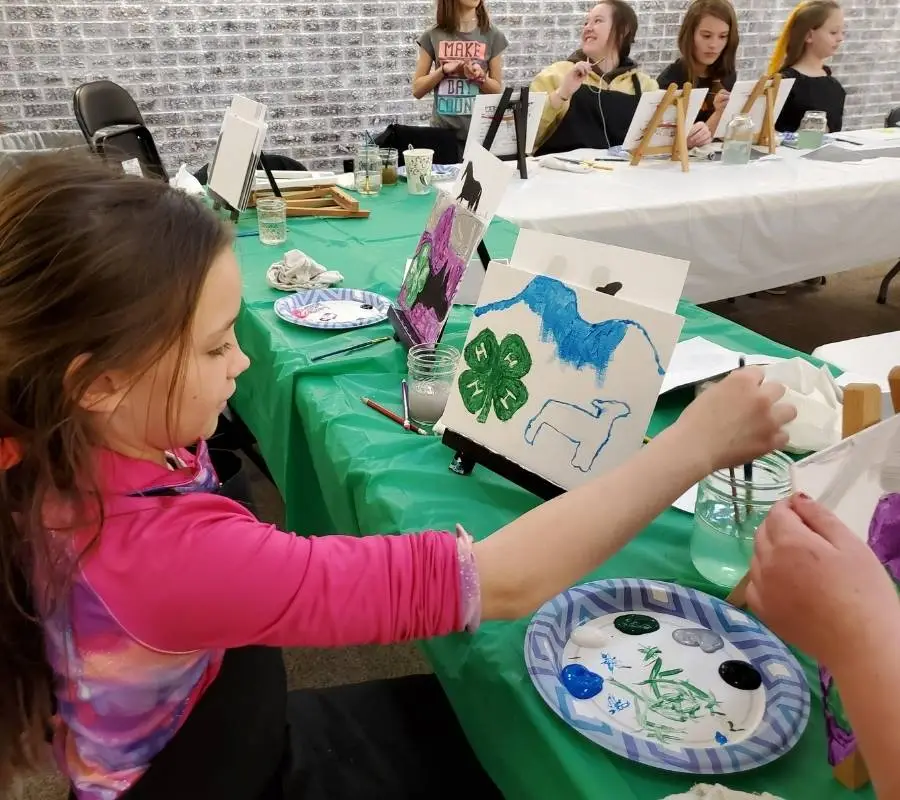 kids painting for 4-H cloverbuds project