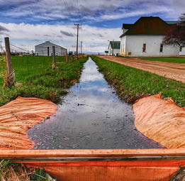 Irrigation ditch full of water 