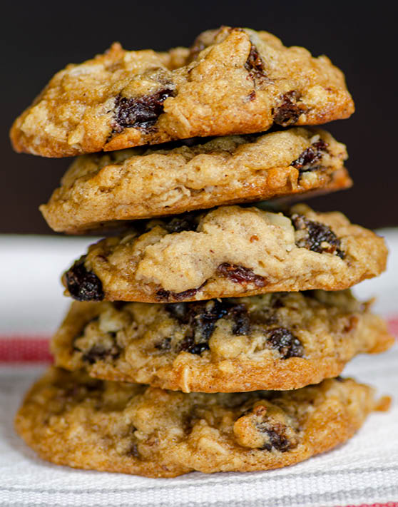 A stack of five soft oatmeal raisin cookies. 