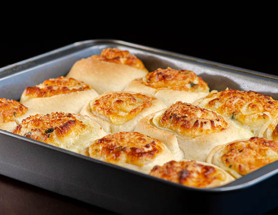 Garlic cheese rolls in a rectangle pan. 