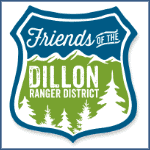 Friends of the Dillon Ranger District logo featuring a shield design with a mountainous landscape and pine trees, in green and white. The text reads 'Friends of the Dillon Ranger District' with 'Dillon' prominently displayed in bold.
