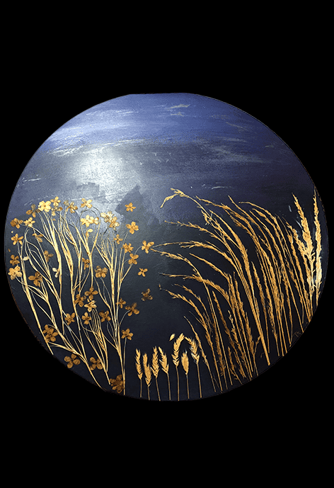 Circular artwork with a deep blue background and golden silhouettes of wheat and wildflowers.