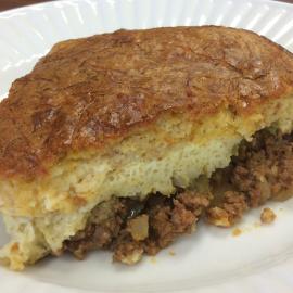 slice of taco pie on white plate