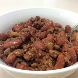 bowl of chili with spoon