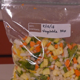 mixed vegetables in resealable plastic bag with written text "8/15/18 Vegetable Mix"