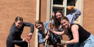 Students working in a garden