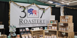 307 Roastery banner with bags of coffee