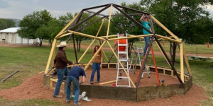 People building a geodome
