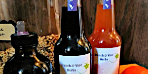 Bottles of syrup and cider