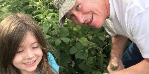 Smiling man and little girl