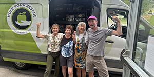 People standing in front of van