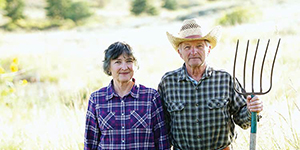 Couple standing in a field