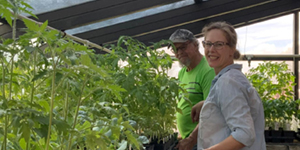 Two people in a garden