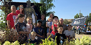 People and plants on a float
