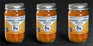 Jars of canned carrots