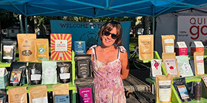 Woman with tea display