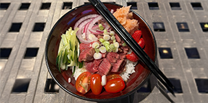 Bowl of noodles with chopsticks