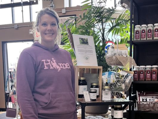 Lady standing in a shop