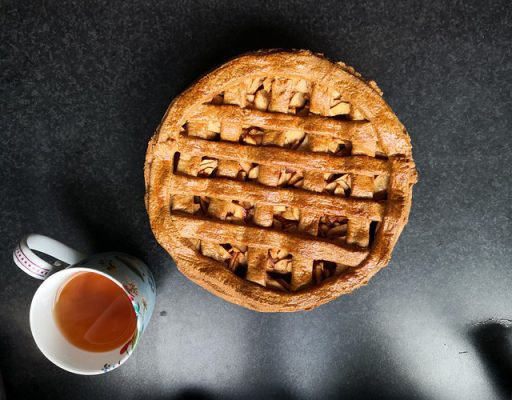 Fruit pie and cup of tea