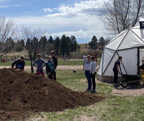 Students working in a garden