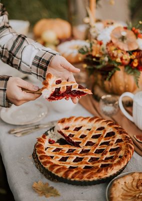 Person serving pie