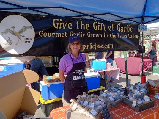 Woman selling garlic