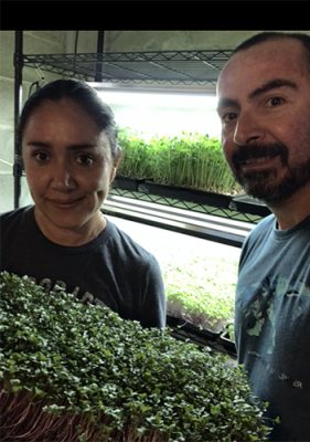 Great MicroGreens owners with microgreens