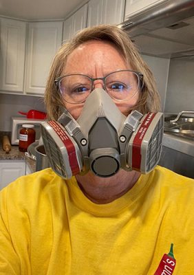 Woman wearing a respirator.