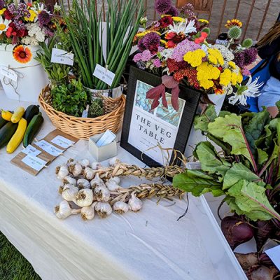 Table of produce and flowers