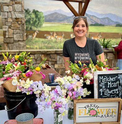 Woman selling flowers.