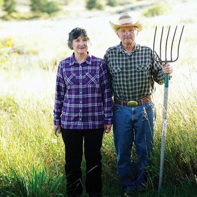 Couple standing in a field
