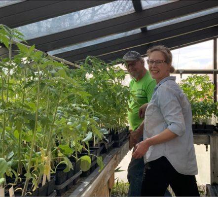 Two people in a garden