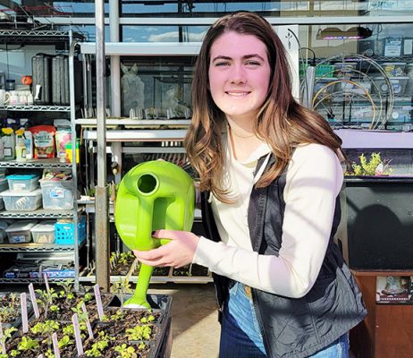 Woman with watering can