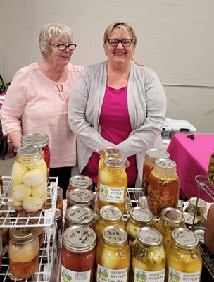 Two happy ladies with homemade goods