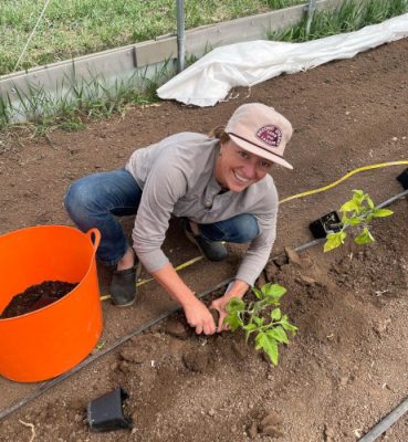 Woman planting garden