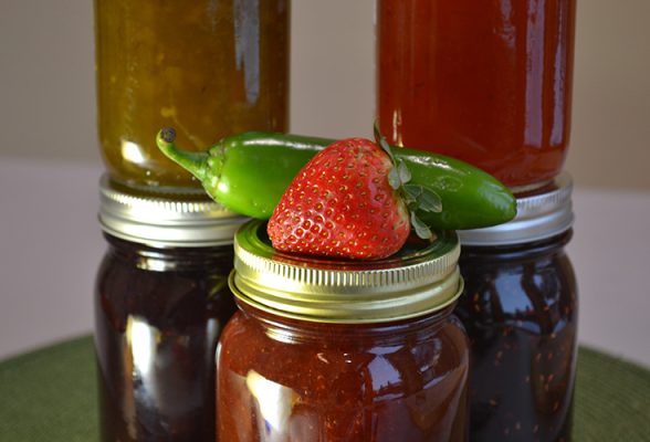 Jars of jam and fresh produce