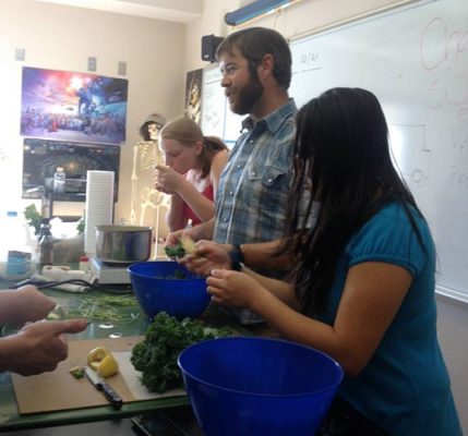 People preparing foods.