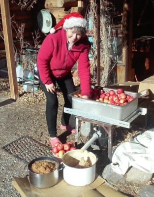 Woman working with apples.