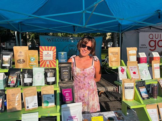Woman with tea display