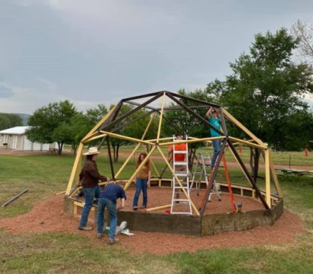 People building a geodome
