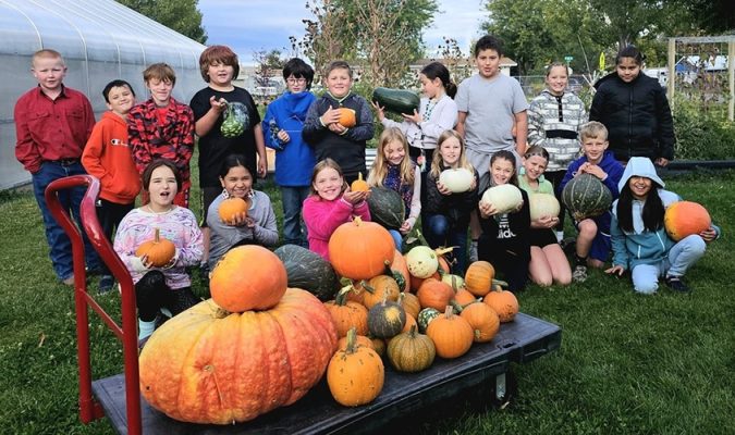 Students with pumpkins